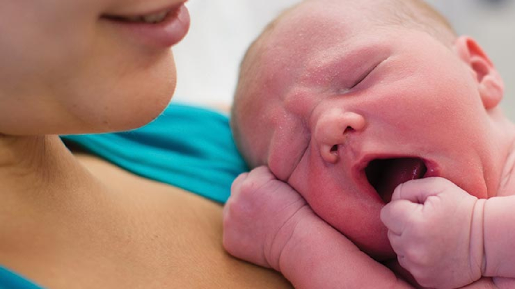 Mother Holding Her Baby 1