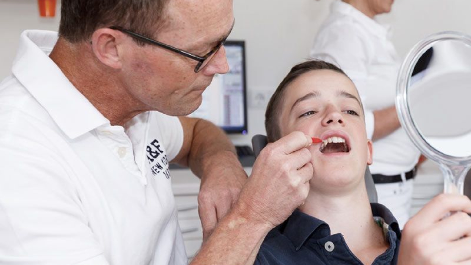Dentist Working on Childs Teeth 3